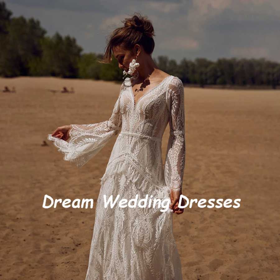 Фотография №1 товара Свадебное платье DREAM с V-образным вырезом, расклешенными рукавами и кружевом,