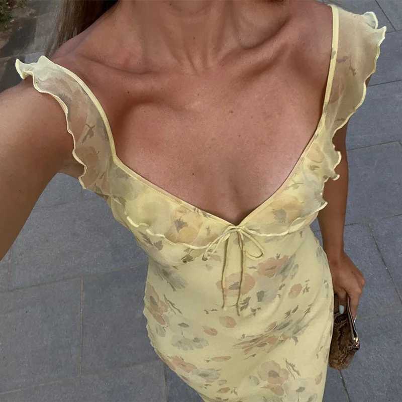 Фотография №1 товара Криптографическое летнее платье макси с цветочным принтом и глубоким вырезом,