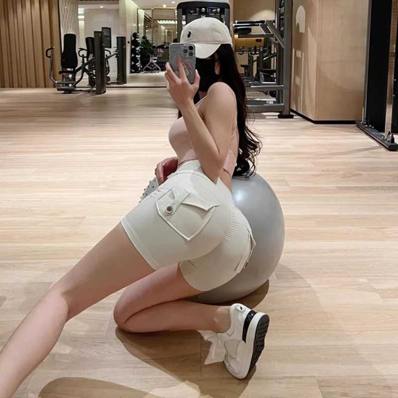 Фотография №5 товара TRY TO BN Женские спортивные шорты с карманами, эффектом подтяжки