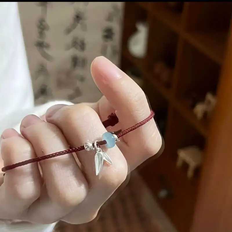 Браслет из бамбуковых листьев с красной веревкой, простой плетеный, универсальный, для пар, лучших друзей, студентов, в китайском стиле, с узлом &laquo;Он-Шор&raquo;. Бижутерия